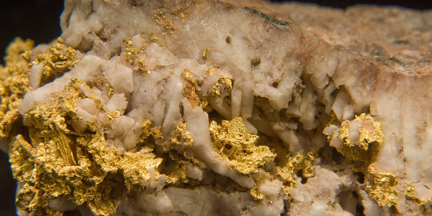 closeup-shot-of-native-gold-isolated-on-a-black-ba-2023-03-03-02-54-58-utc