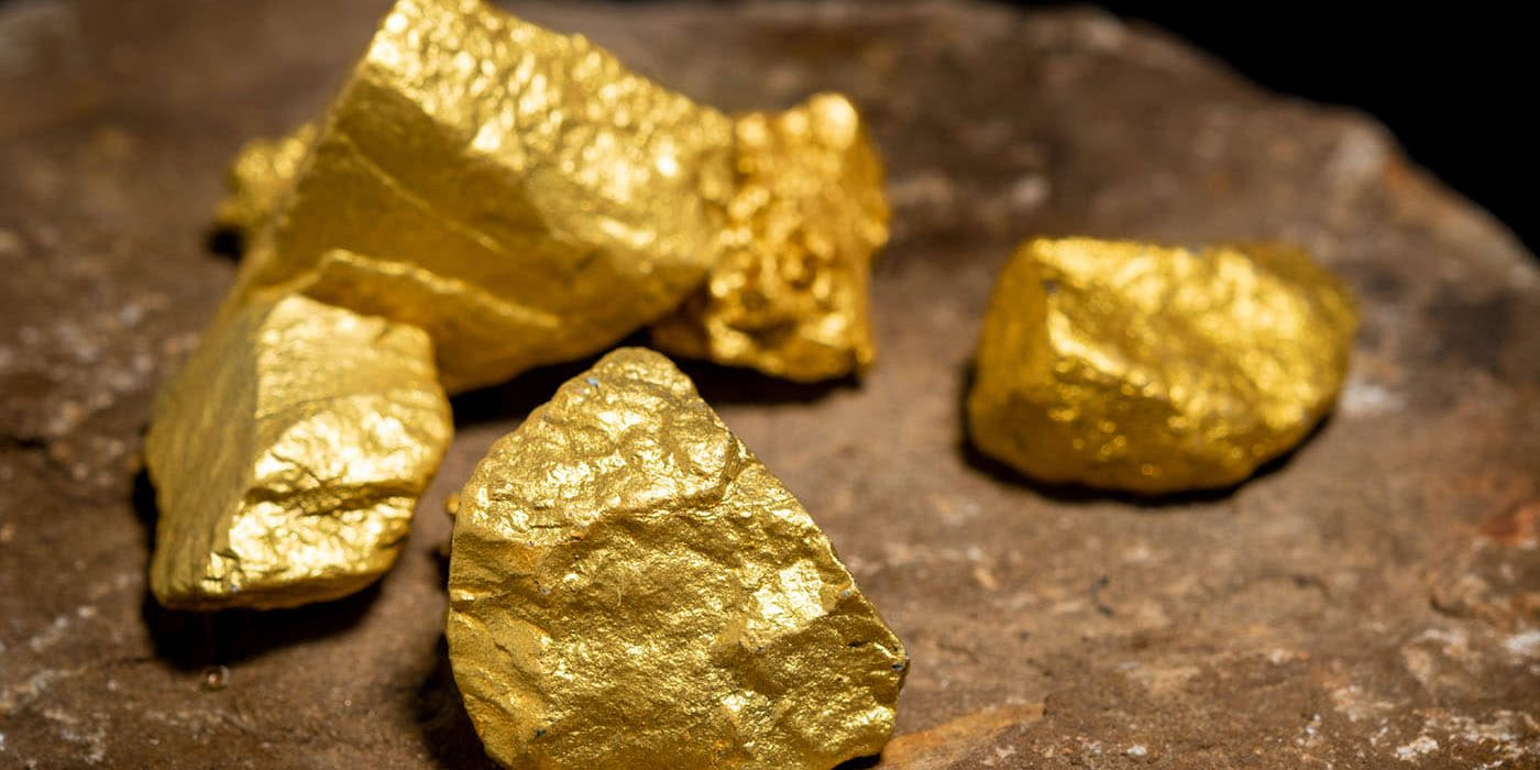 the-pure-gold-ore-found-in-the-mine-on-a-stone-flo-2022-09-15-00-18-21-utc