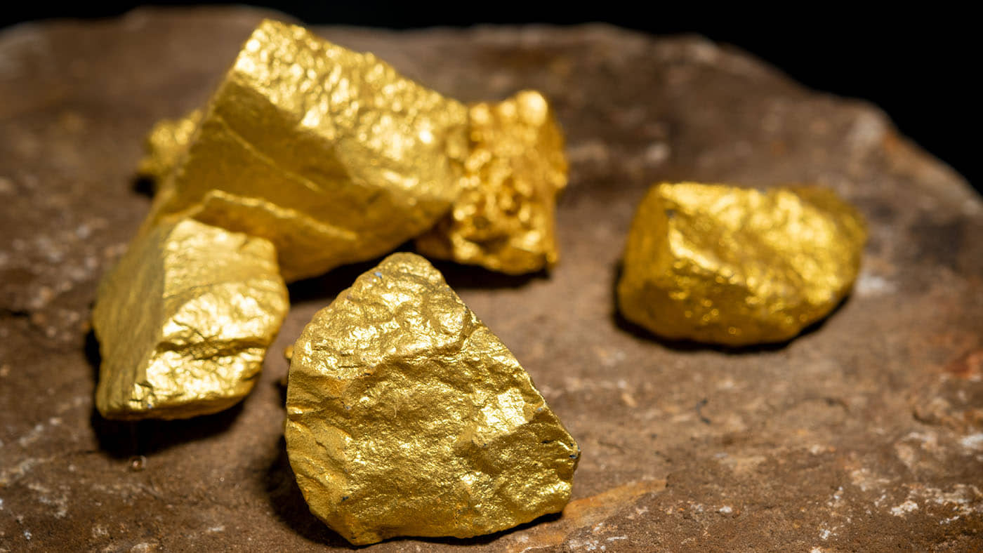 the-pure-gold-ore-found-in-the-mine-on-a-stone-flo-2022-09-15-00-18-21-utc